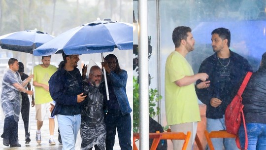 Romulo Estrela e Thiago Fragoso gravam cena de 'Travessia' sob forte chuva no Rio