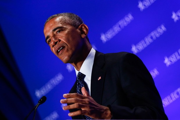 Obama: mestre do carisma (Foto: Pool/Getty Images)