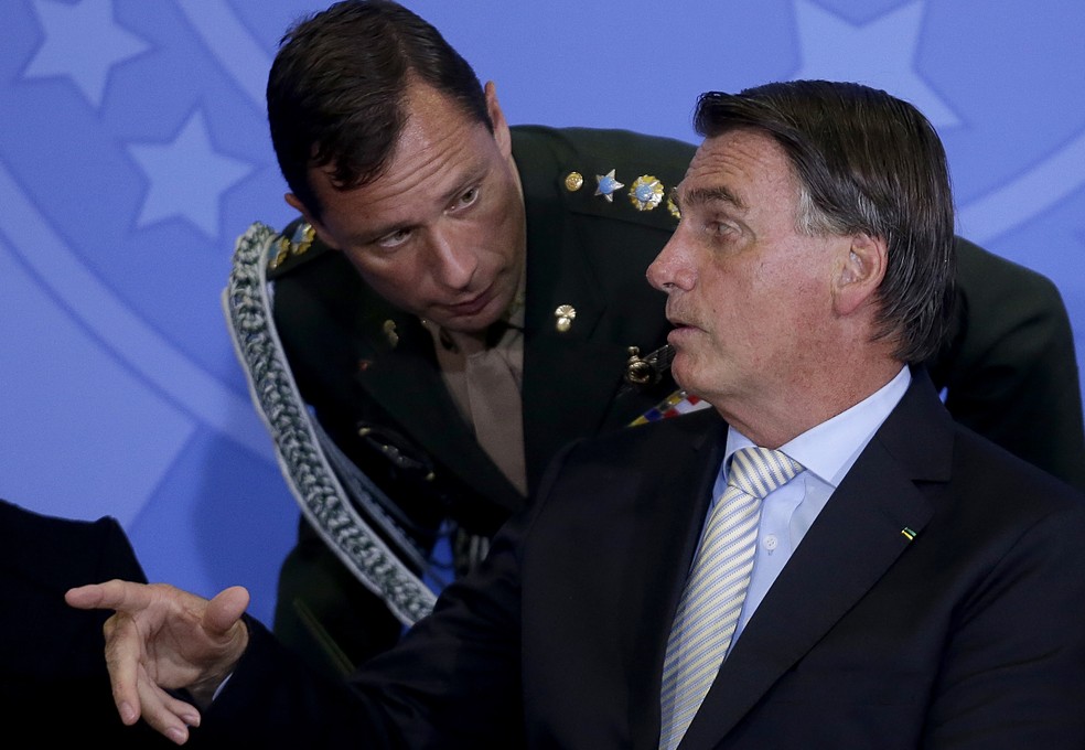 Tenente-coronel Mauro Cid e o ex-presidente Jair Bolsonaro — Foto: Dida Sampaio/Estadão Conteúdo