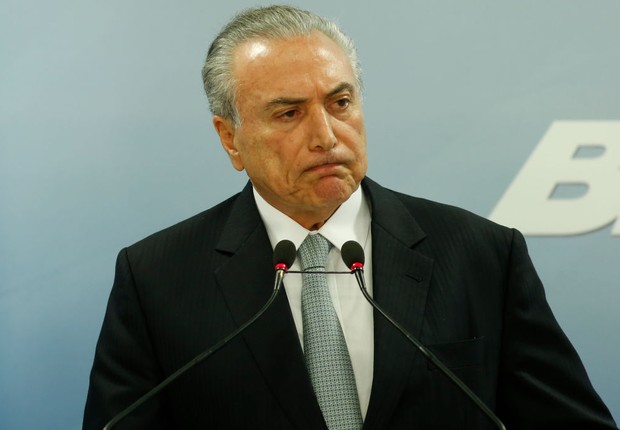 O presidente Michel Temer em pronunciamento oficial no Planalto (Foto: Igo Estrela/Getty Images)