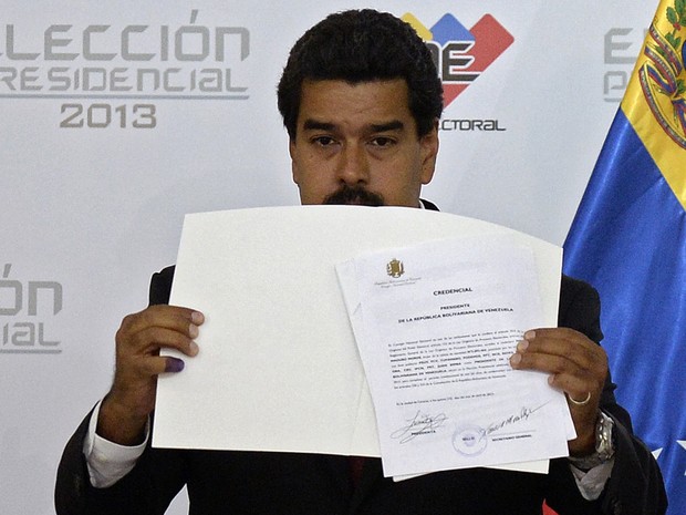 O Conselho Nacional Eleitoral da Venezuela proclamou nesta segunda-feira (15) Nicolás Maduro como novo presidente, um dia após a vitória dele sobre Henrique Capriles nas urnas (Foto: Juan Barreto/AFP)