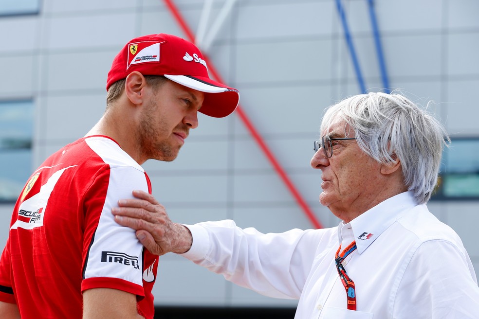Sebastian Vettel e Berniel Ecclestone no GP da Inglaterra — Foto: Charles Coates/Getty Images