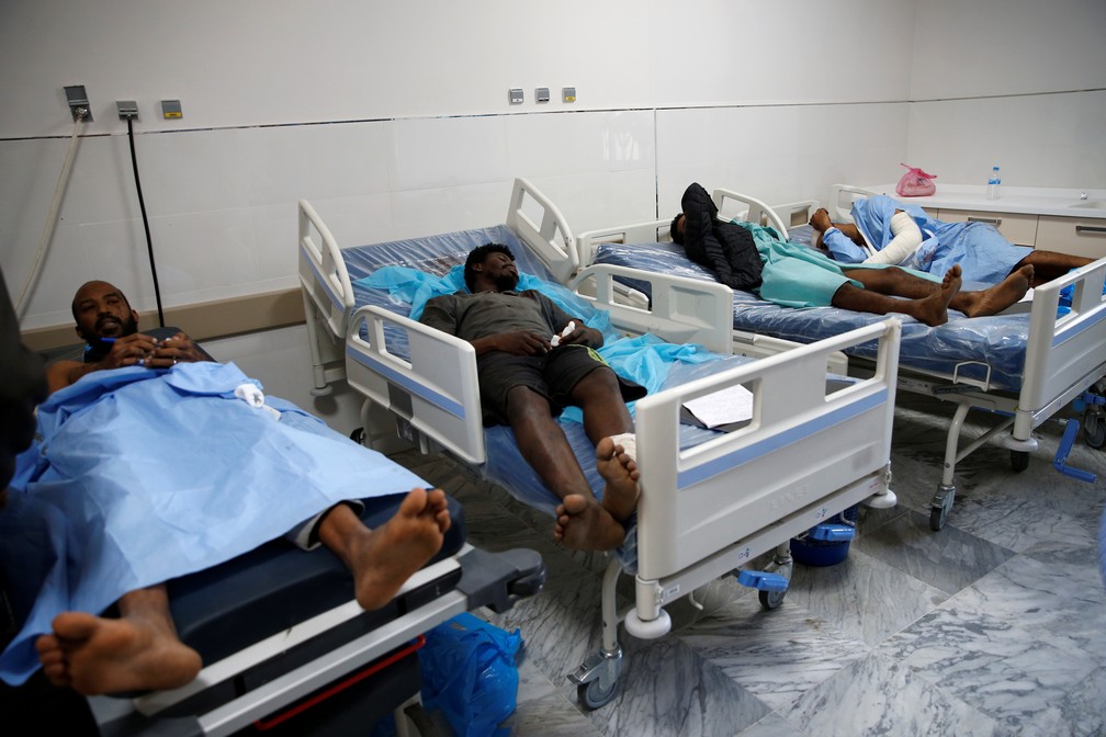 A foto, de 3 de julho, mostra migrantes feridos depois no hospital central de TrÃ­poli, na LÃ­bia, depois que um ataque aÃ©reo atingiu um centro de detenÃ§Ã£o na cidade de Tajoura. Segundo a ONU, homicÃ­dios mataram mais do que conflitos armados em 2017. â€” Foto: Ismail Zitouny/Reuters