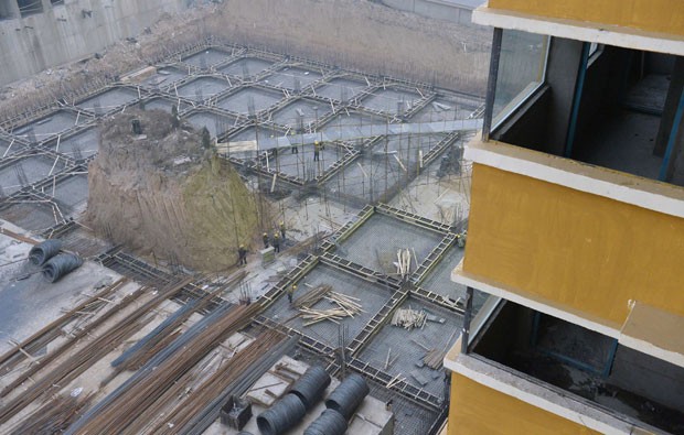 Construção do prédio foi iniciada há sete meses na China (Foto: Reuters)
