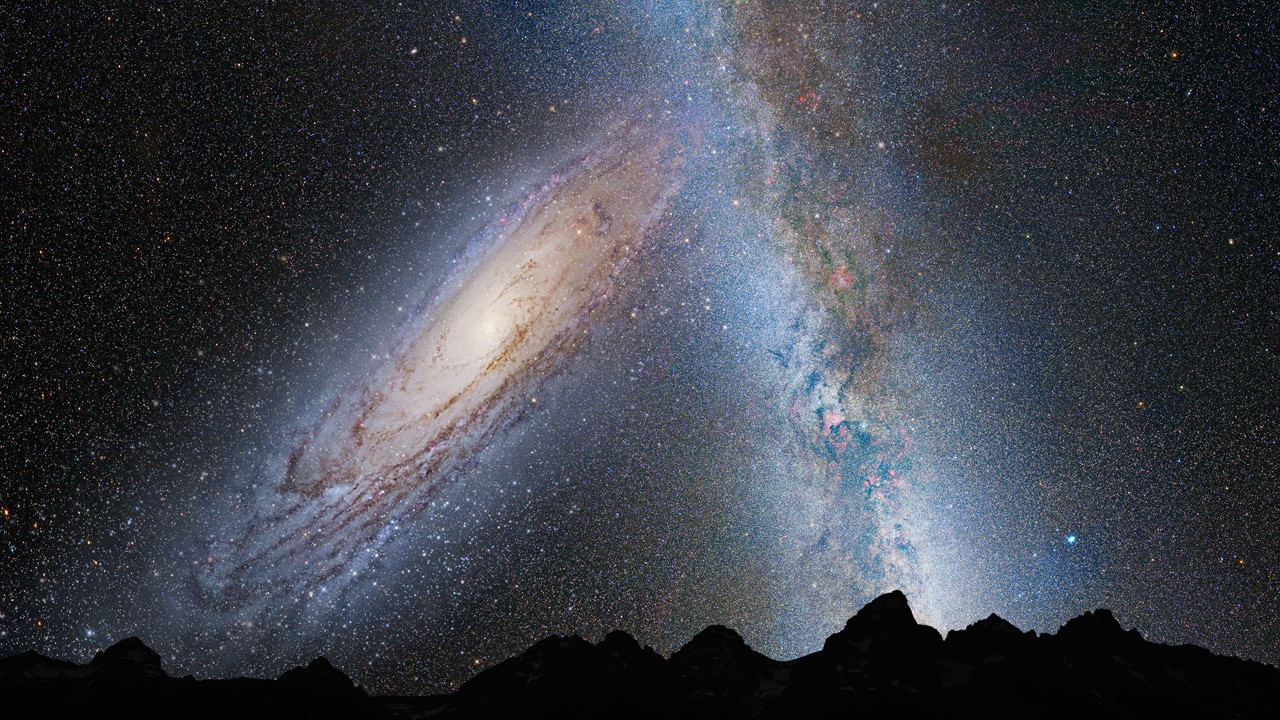 Projeção do momento em que a Via Láctea se chocar com Andrômeda, em 4 bilhões de anos. (Foto: NASA)
