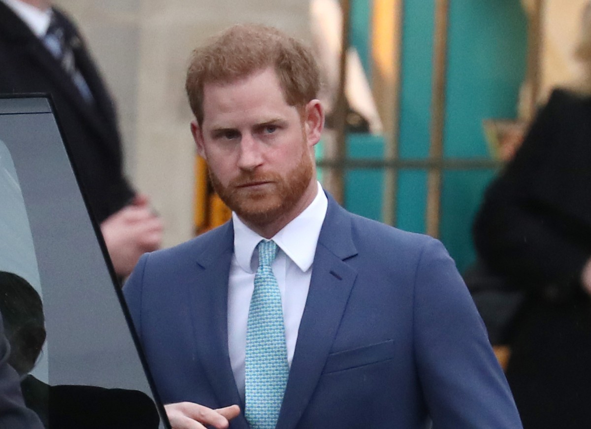 On a commercial flight, Prince Harry and the Royals arrive in England for the coronation of King Charles III