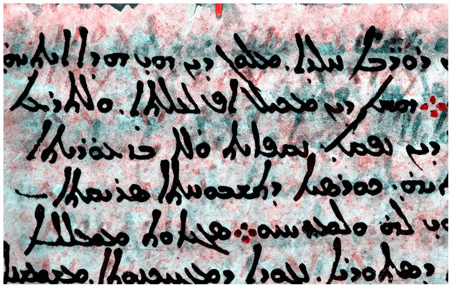 Subtexto grego aprimorado aparece em vermelho abaixo do sobretexto siríaco em preto