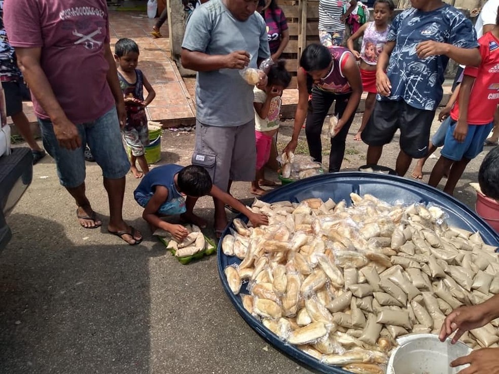 Comida recusada por presos foi doada a venezuelanos que estão vivendo em abrigos da capital acreana — Foto: Divulgação/Iapen-AC