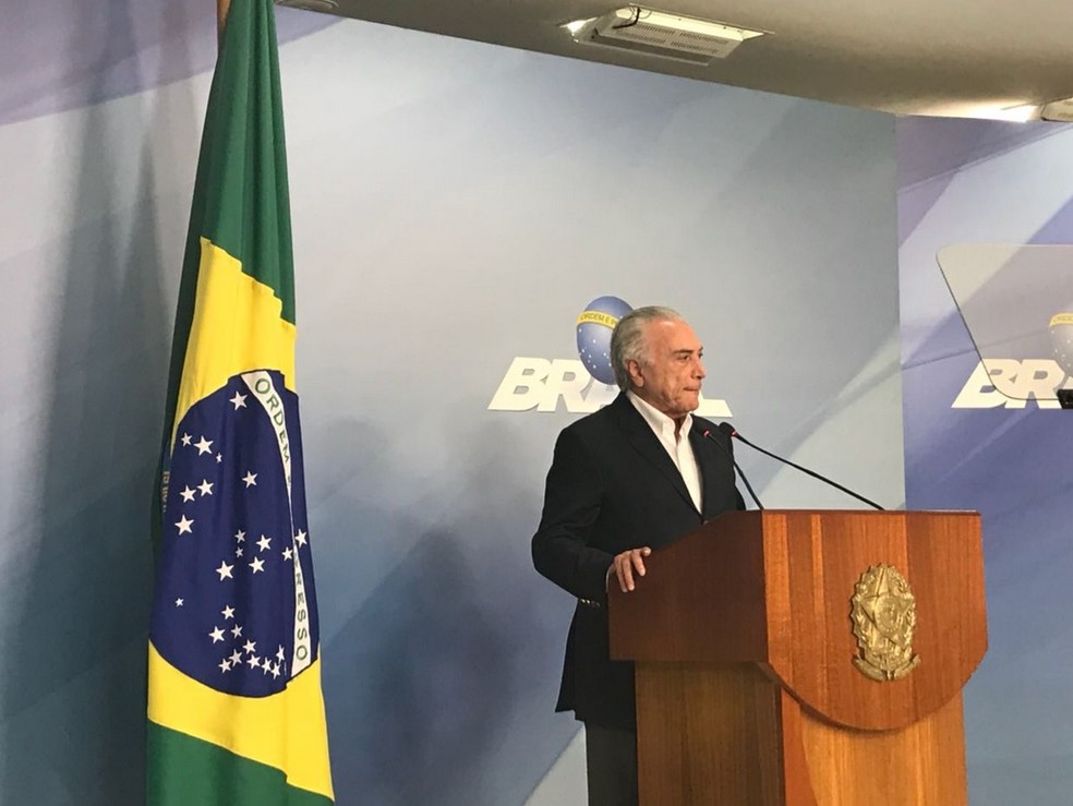 O presidente Michel Temer, durante pronunciamento no Palácio do Planalto neste domingo (27) (Foto: Fernanda Calgaro/G1)