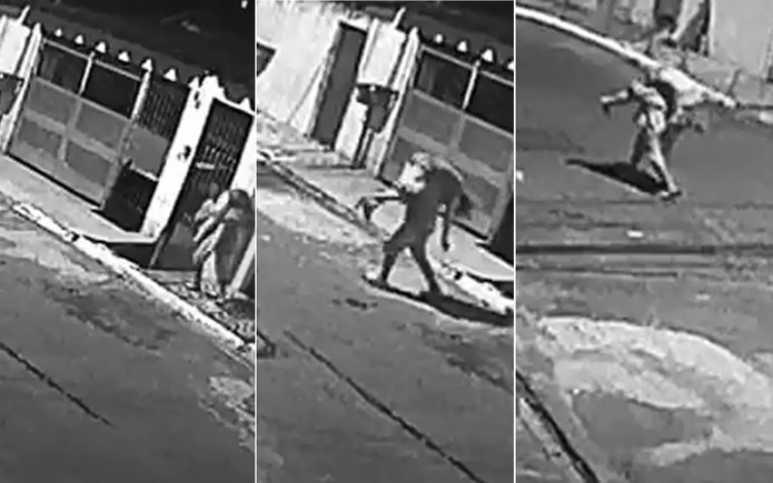 Homem carrega corpo de companheira no Capão Redondo — Foto: Reprodução/Câmera de segurança