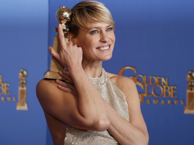 Robin Wright vence o prêmio de melhor atriz em série dramática por &#39;House of cards&#39; no 71º Globo de Ouro, que acontece neste domingo (12), em Los Angeles. (Foto: REUTERS/Lucy Nicholson)