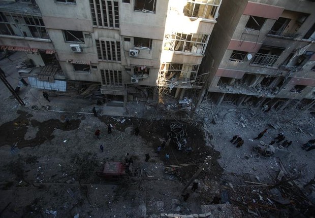 Prédio destruído em  Douma, na Síria. Foto tirada em 7 de abril (Foto: EFE/EPA/Mohammed Badra)