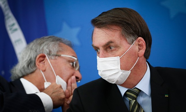 Paulo Guedes e Jair Bolsonaro em entrevista sobre o coronavírus