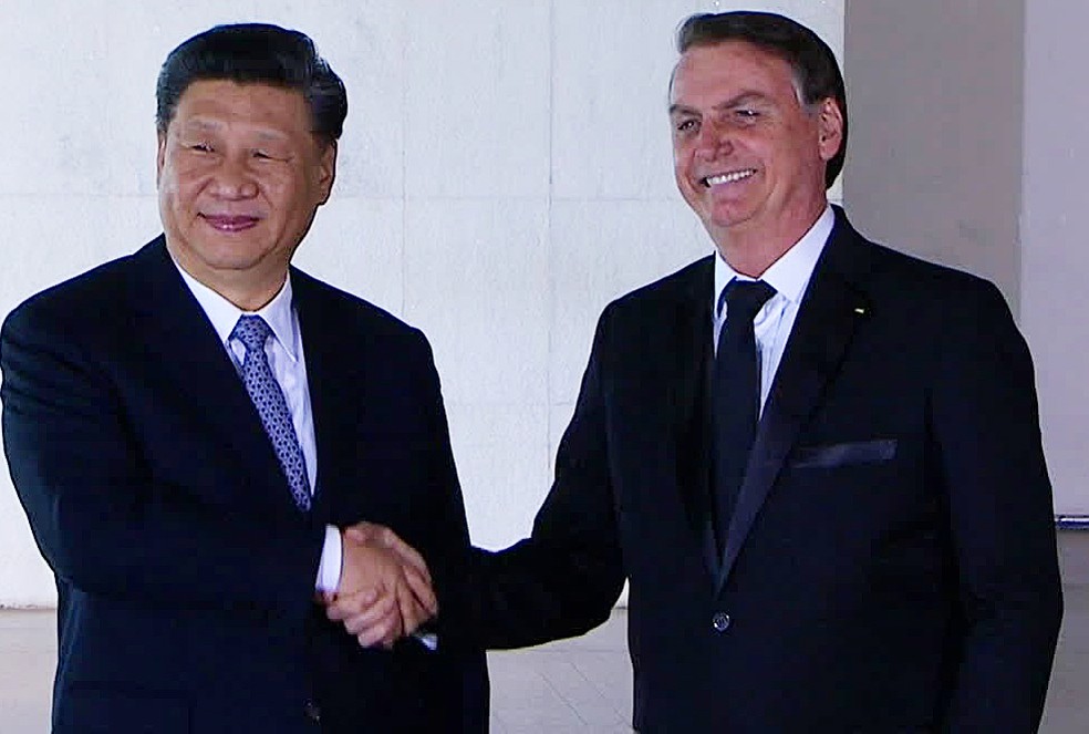 O presidente Jair Bolsonaro e o presidente da China, Xi Jinping, na manhã desta quarta-feira (13) — Foto: Reprodução/TV Brasil