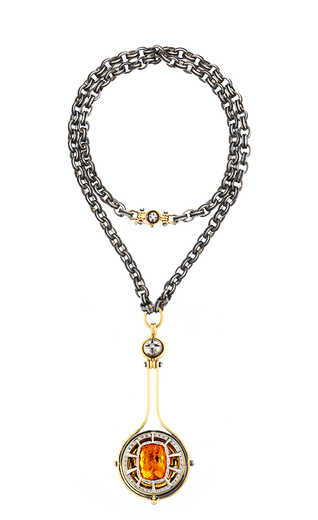 The "Pluton" pendant necklace from the "Sirius" collection in open position, revealing a citrine orb (Foto: ELIE TOP)