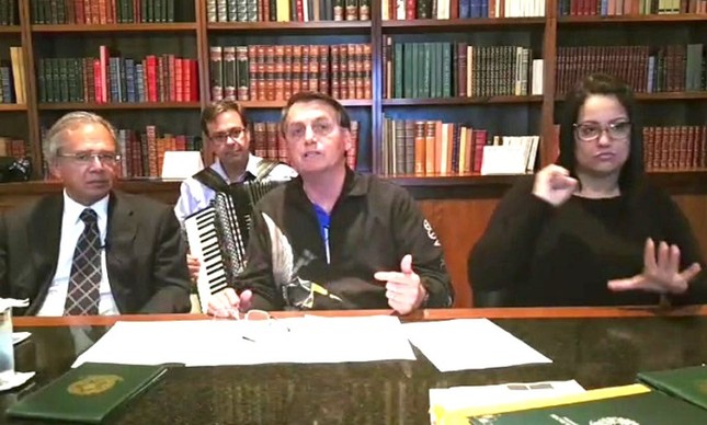 Os ministros Paulo Guedes e Gilson Machado em live com Bolsonaro 