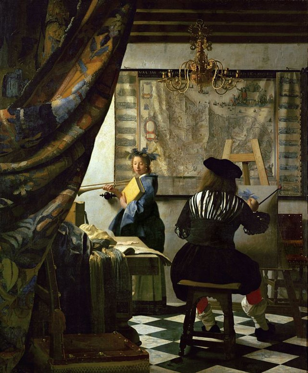 Será ele? Especialistas acreditam que Vermeer talvez tenha feito seu autorretrato de costas em 'A Arte da Pintura' — Foto: Getty Images