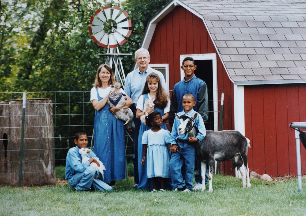 Undated photo provided by Roger and Rosanna Schreiner shows his adopted son Paul Fernando Schreiner (right) alongside the other family members - Photo: Courtesy of the Schreiner Family via AP