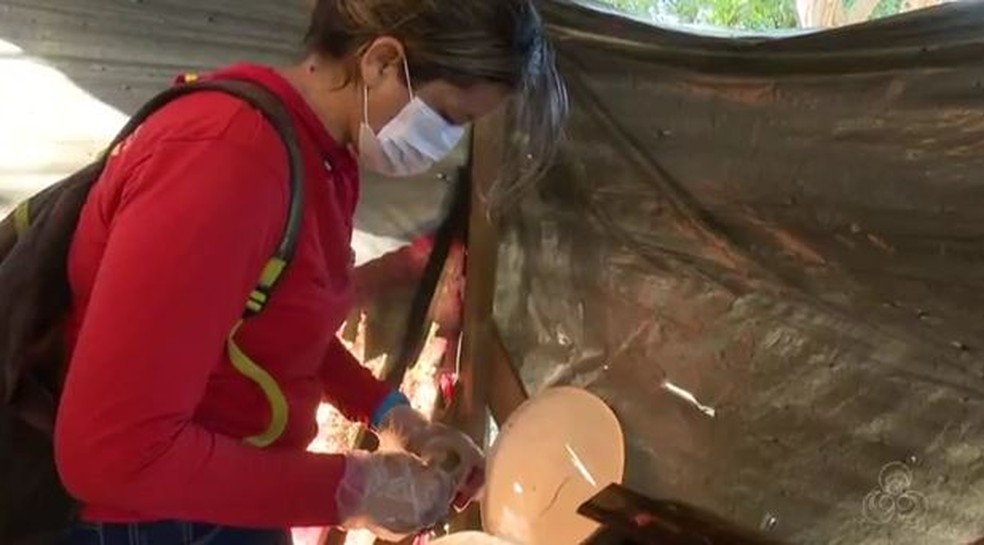 Agentes de endemias realizam mutirão contra a dengue no bairro Taquari, em Rio Branco. Nova regra do PNAB planeja que agente tambem cuide de outras doenças (Foto: Reprodução/Rede Amazônica Acre)