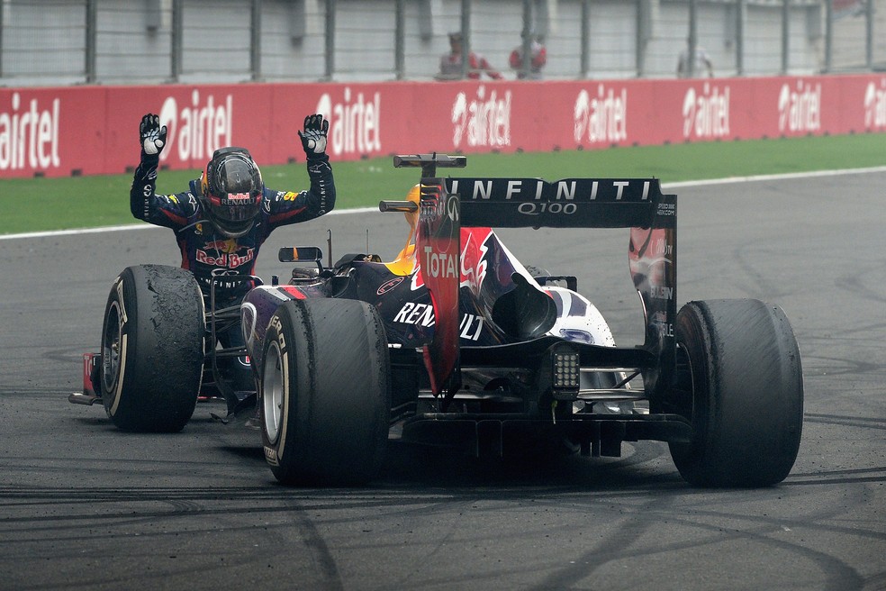 A icônica imagem do tetracampeonato de Sebastian Vettel após vencer o GP da Índia de 2013 — Foto: Getty Images