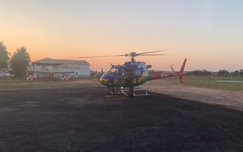 GTA chega ao Aeroclube de Aracaju com jovem que estava desaparecida — Foto: Marcílio Nocrato/TV Sergipe