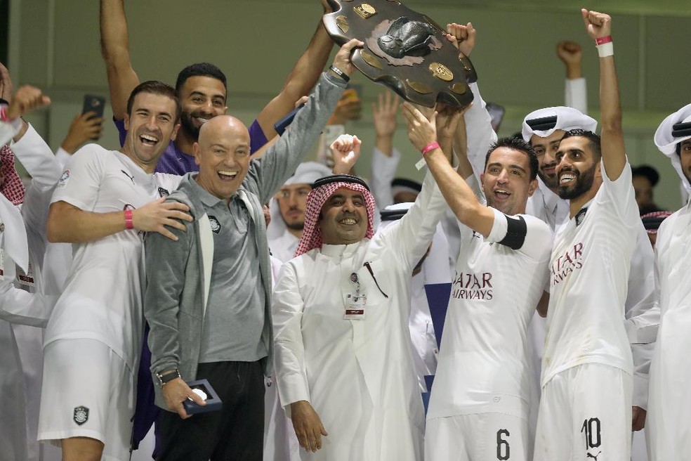 Xavi foi campeo como jogaodor e tcnico do Al-Sadd  Foto: Divulgao / Al-Sadd