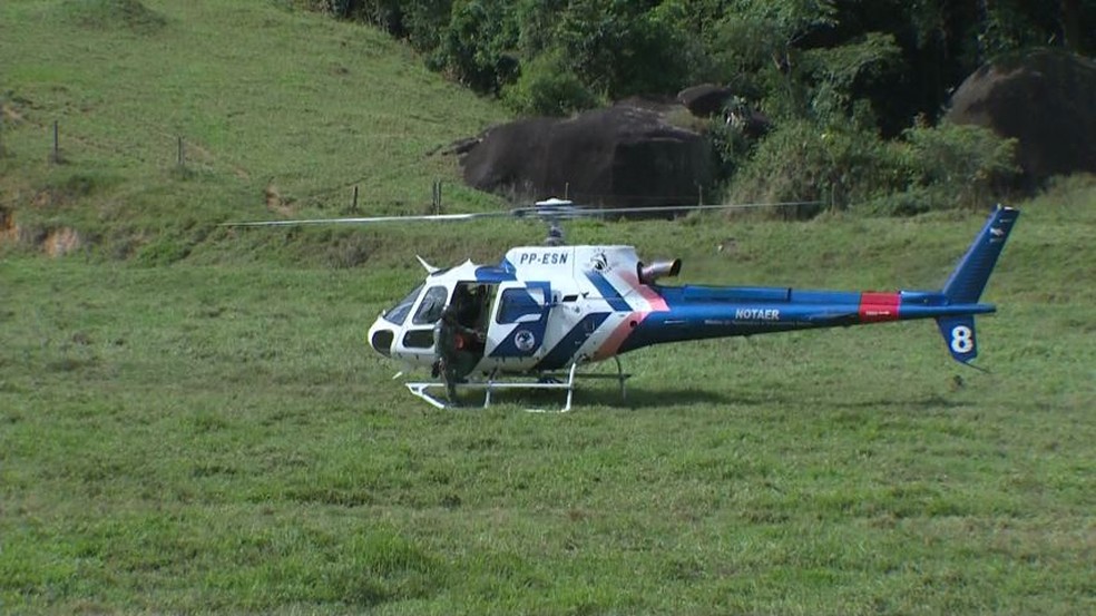Atleta foi resgatado de helicóptero — Foto: Reprodução/ TV Gazeta