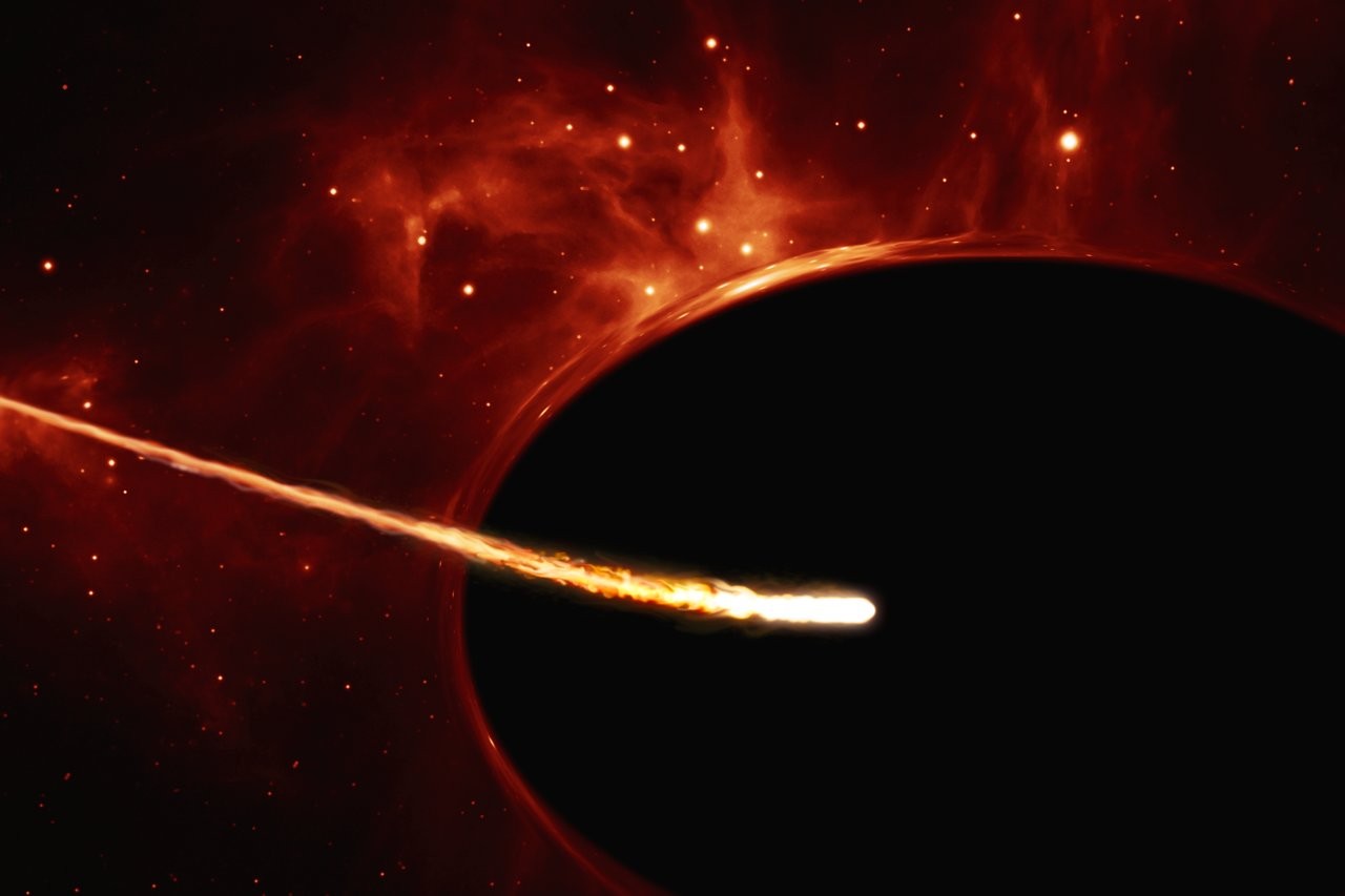 Concepção artística mostra buraco negro com 100 milhões de massas solares devorando estrela como o Sol (Foto: ESO, ESA/Hubble, M. Kornmesser)