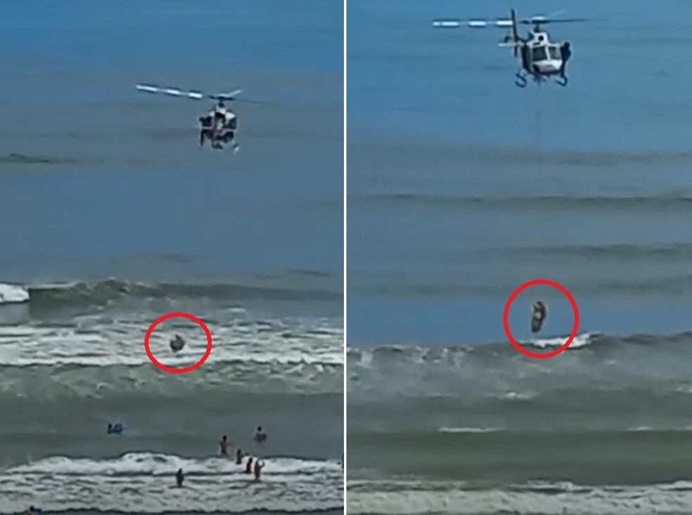 Jovem que se afogava em Praia Grande foi resgatado guarda-vidas do helicóptero Águia da PM — Foto: Reprodução