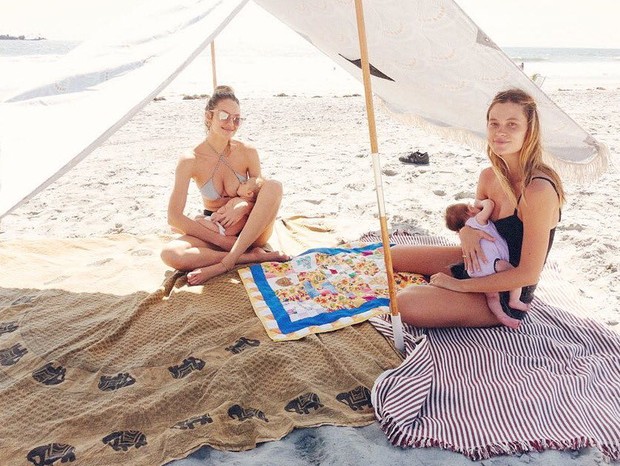 Candice Swanepoe amamenta seu filho na praia (Foto: Reprodução / Instagram)