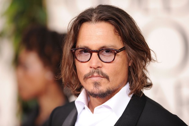 Johnny Depp: não abre mão dos óculos (Foto: Getty Images)