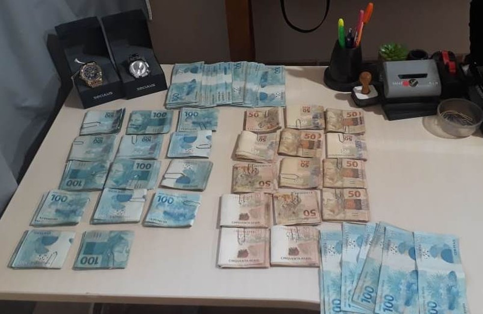 PolÃ­cia apreende dinheiro com suspeito de extorsÃ£o no PA. â Foto: ReproduÃ§Ã£o / PolÃ­cia Civil